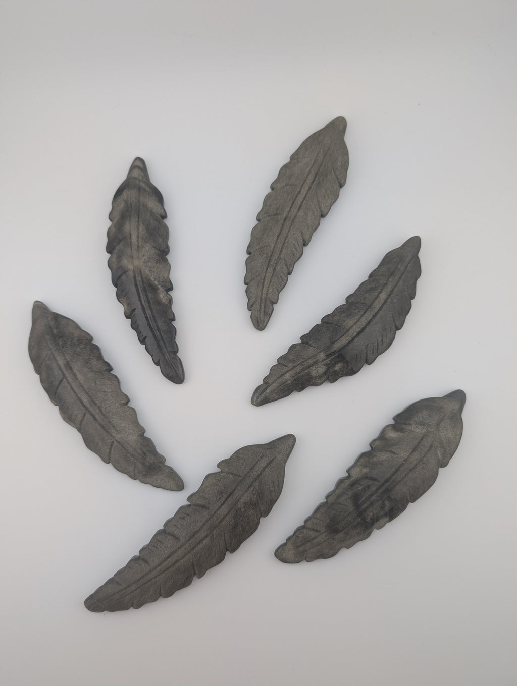 Gold Obsidian Federn